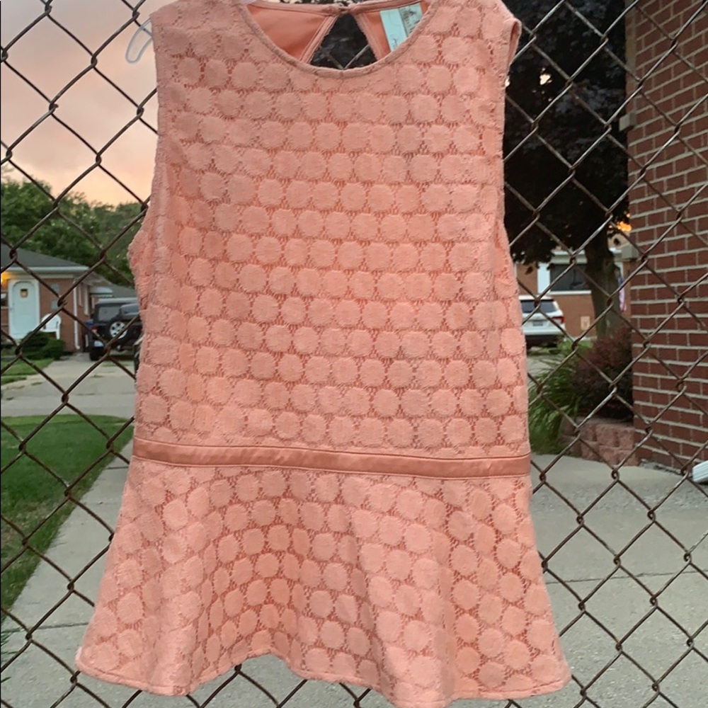Light coral peplum top